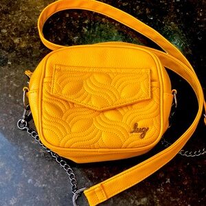 NWT LUG swing in vegan leather. Never been used. Smoke free home